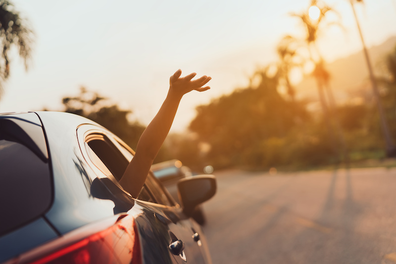 Hatchback Car travel driving road trip of woman summer vacation in blue car at sunset,Girls happy traveling enjoy holidays and relaxation with friends together get the atmosphere and go to destination